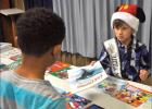 Williams-Ledger student donates holiday books to Boys & Girls Club