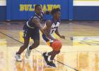 Bulldawgs upend Wolves