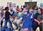 Hettie Halstead teachers take pies to the face for improved student performance