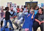 Hettie Halstead teachers take pies to the face for improved student performance
