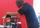 Fairview-Miss Jewell students get haircuts for summer