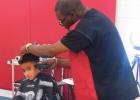 Fairview-Miss Jewell students get haircuts for summer